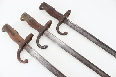 Lot 1262 - THREE FRENCH BAYONETS