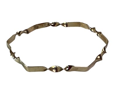 Lot 17 - GOLD BANGLE