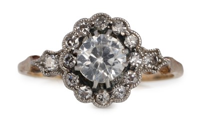 Lot WHITE SAPPHIRE AND DIAMOND CLUSTER RING