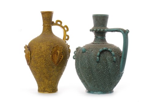 Lot 809 - TWO ZSOLNAY PECS POTTERY EWERS the first of...