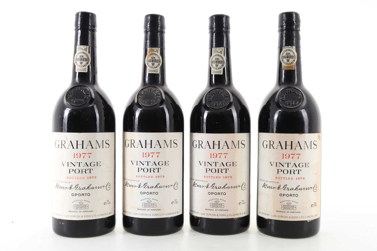 Lot 36 - FOUR BOTTLES OF GRAHAM'S 1977 VINTAGE