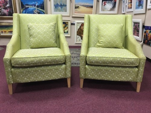Lot 1249 - TWO LARGE CONTEMPORARY WINGBACK CHAIRS IN THE...