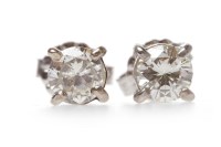 Lot 40 - PAIR OF DIAMOND STUD EARRINGS each set with a...