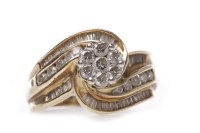 Lot 79 - DIAMOND CLUSTER RING set with a central...