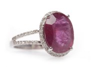 Lot 194 - RUBY AND DIAMOND DRESS RING set with a central...