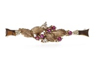 Lot 197 - RUBY AND DIAMOND BROOCH with foliate...