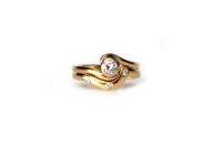 Lot 198 - DIAMOND DRESS RING set with a central round...