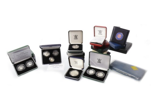 Lot 547 - TWENTY THREE SILVER PROOF COINS all in boxes,...