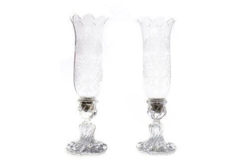 Lot 784 - PAIR OF BACCARAT GLASS CANDLESTICKS the long...