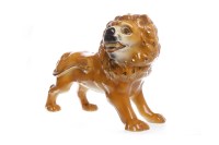 Lot 807 - PAIR OF VICTORIAN STONEWARE LIONS with glass...