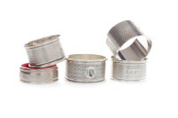 Lot 355 - COMPOSITE GROUP OF FIVE SILVER NAPKIN RINGS...