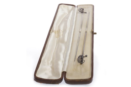 Lot 401 - PAIR OF EARLY 20TH CENTURY SILVER HAT PINS...