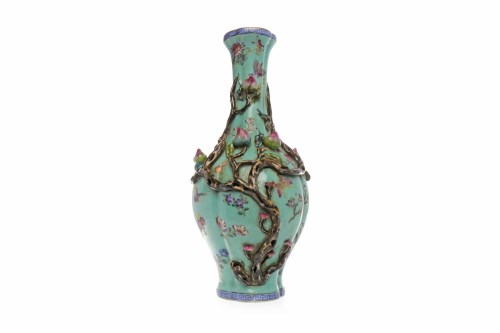 Lot 555 - EARLY 20TH CHINESE VASE with fruiting vines in...