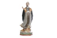 Lot 557 - MID 20TH CENTURY CHINESE STANDING FIGURE OF A...