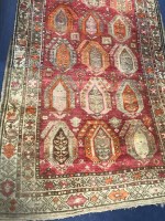 Lot 675 - CAUCASIAN BORDERED RUNNER decorated with three...