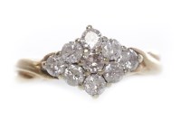 Lot 23 - DIAMOND CLUSTER RING the bezel of rhombic form...