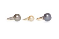 Lot 66 - THREE PEARL SET RINGS comprising one set with...