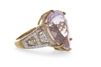 Lot 72 - PINK GEM AND DIAMOND SET RING set with a pink...