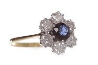 Lot 102 - SAPPHIRE AND DIAMOND CLUSTER RING set with a...
