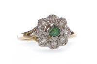 Lot 124 - EMERALD AND DIAMOND CLUSTER RING set with a...