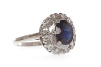 Lot 134 - SAPPHIRE AND DIAMOND CLUSTER RING the oval...