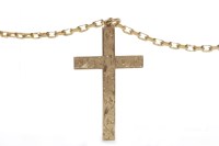 Lot 143 - NINE CARAT GOLD CROSS with engraved decoration...