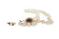 Lot 153 - CULTURED PEARL NECKLACE formed by spherical...
