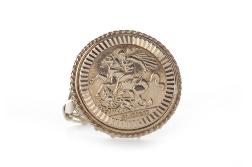 Lot 6 - NINE CARAT GOLD SOVEREIGN STYLE RING with a...
