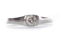 Lot 110 - DIAMOND SOLITAIRE RING with a round brilliant...