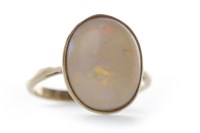 Lot 124 - EDWARDIAN OPAL RING set with a large cabochon...