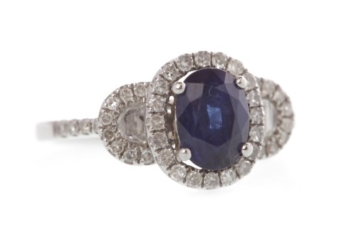 Lot 138 - SAPPHIRE AND DIAMOND RING the oval sapphire of...