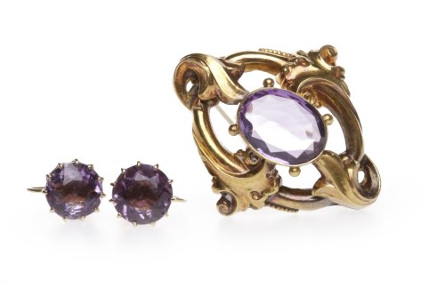 Lot 17 - LATE VICTORIAN AMETHYST BROOCH set with a...