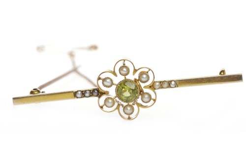 Lot 32 - EDWARDIAN PERIDOT AND PEARL BAR BROOCH with a...