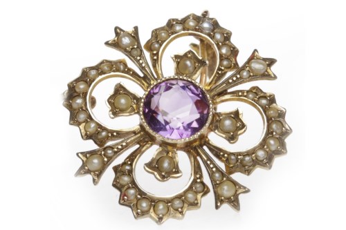 Lot 33 - EDWARDIAN AMETHYST AND SEED PEARL BROOCH of...
