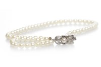Lot 63 - MIKIMOTO PEARL NECKLACE formed by a single...