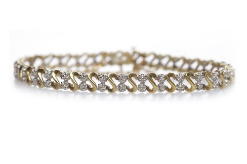 Lot 78 - NINE CARAT GOLD DIAMOND SET BRACELET formed by...