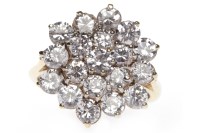 Lot 83 - GEM SET DRESS RING with a large snowflake...