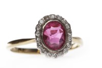 Lot 88 - CREATED RUBY AND DIAMOND RING set with a...