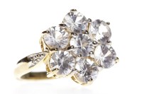 Lot 134 - NINE CARAT GOLD CZ CLUSTER RING the daisy...