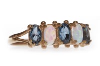 Lot 200 - ROSE GOLD PLATED OPAL AND TOPAZ RING set with...