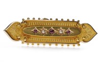 Lot 229 - VICTORIAN FIFTEEN CARAT GOLD RUBY AND PEARL...