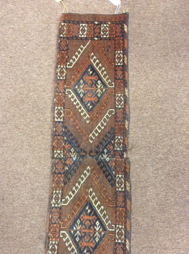 Lot 568 - TURKOMAN BORDERED MAT comprising two sections,...