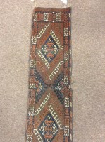 Lot 568 - TURKOMAN BORDERED MAT comprising two sections,...