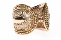 Lot 71 - UNUSUAL DIAMOND DRESS RING of torc form with...