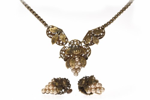 Lot 139 - LATE VICTORIAN GILT METAL VINE AND GRAPE MOTIF...