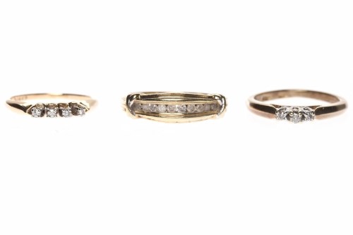 Lot 149 - SEVEN VARIOUS DRESS RINGS comprising two in...