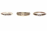 Lot 149 - SEVEN VARIOUS DRESS RINGS comprising two in...