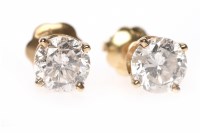 Lot 164 - PAIR OF DIAMOND STUD EARRINGS each with a four...