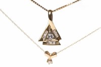 Lot 165 - TWO DIAMOND PENDANTS ON CHAINS one in fourteen...