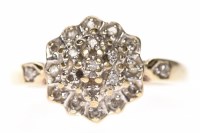Lot 176 - NINE CARAT GOLD DIAMOND CLUSTER RING with a...